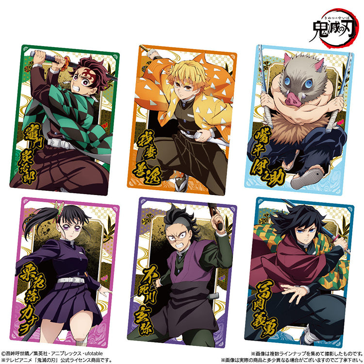Demon Slayer Wafer Vol.10 featuring collectible anime cards and chocolate wafer packaging with Tanjiro, Nezuko, and other characters.