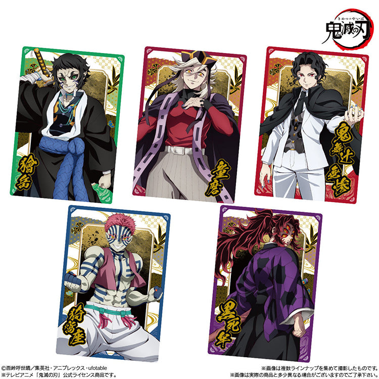 Demon Slayer Wafer Vol.10 featuring collectible anime cards and chocolate wafer packaging with Tanjiro, Nezuko, and other characters.