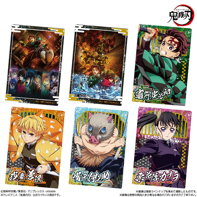 Demon Slayer Wafer Vol.10 featuring collectible anime cards and chocolate wafer packaging with Tanjiro, Nezuko, and other characters.