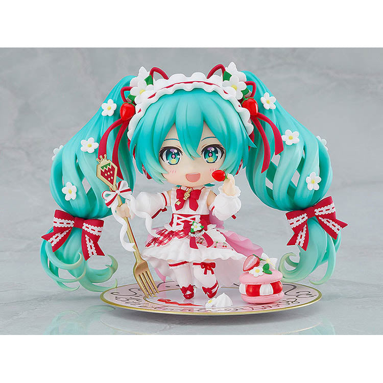Hatsune Miku 15th Anniversary Strawberry Nendoroid figure with interchangeable faces, dessert accessories, and acrylic stand – collectible Vocaloid anime merch