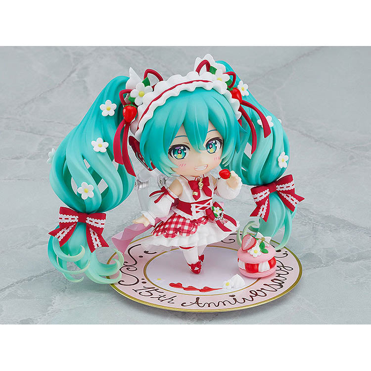 Hatsune Miku 15th Anniversary Strawberry Nendoroid figure with interchangeable faces, dessert accessories, and acrylic stand – collectible Vocaloid anime merch