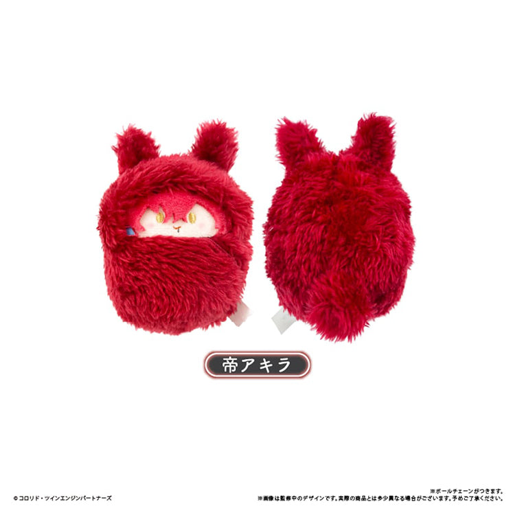 A close-up of a single Kaguya VR avatar plushie in a white fluffy swaddle being held in a person's palm to show its small size.