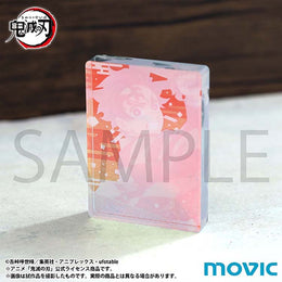 A close-up, angled view of a Demon Slayer Noble Art acrylic block featuring Tanjiro Kamado. The image highlights the thickness and transparency of the premium acrylic material, which creates a multi-layered, three-dimensional effect for the character artwork.