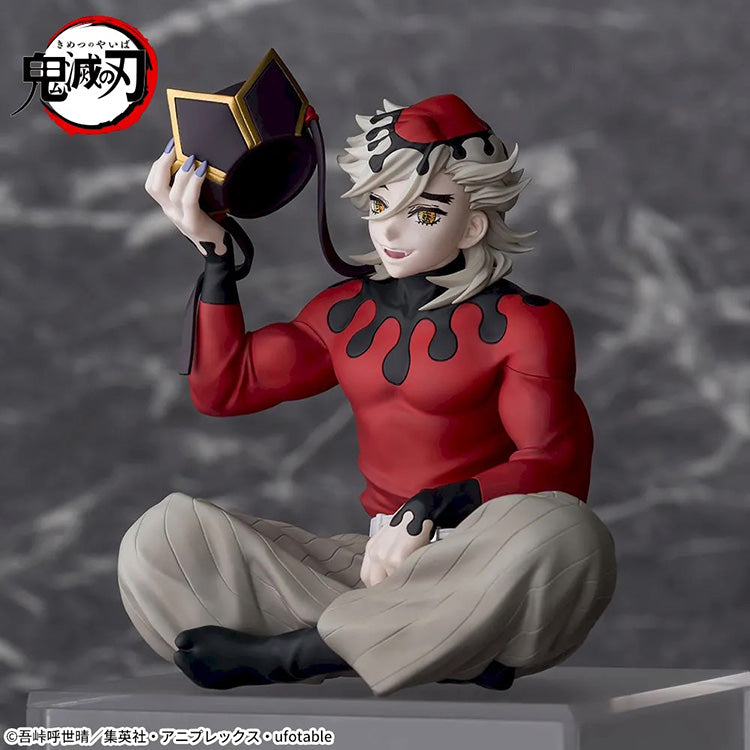 Demon Slayer Doma Premium Perching Figure sitting on a shelf edge with detailed sculpt and vivid colors.