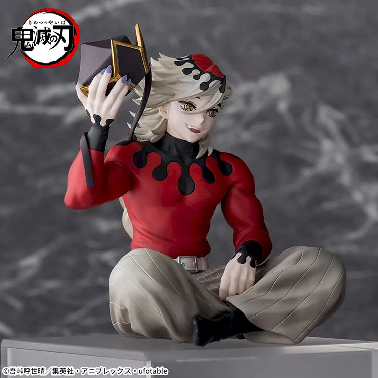 Demon Slayer Doma Premium Perching Figure sitting on a shelf edge with detailed sculpt and vivid colors.