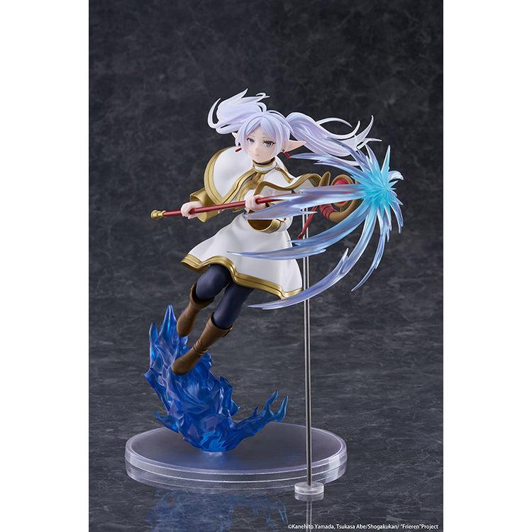 Frieren AMP+ Figure from Frieren: Beyond Journey’s End by Taito, dynamic battle pose with flowing cloak and detailed sculpt.
