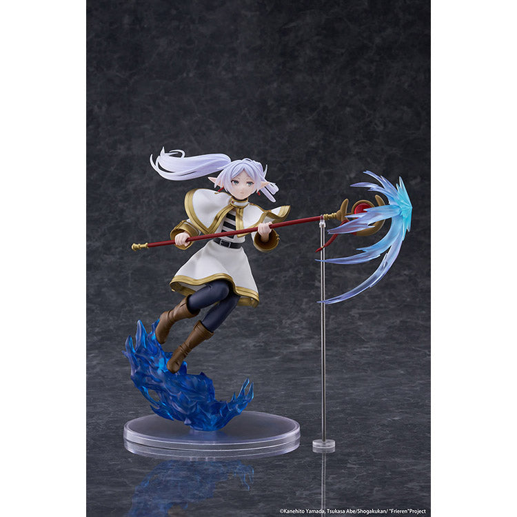 Frieren AMP+ Figure from Frieren: Beyond Journey’s End by Taito, dynamic battle pose with flowing cloak and detailed sculpt.
