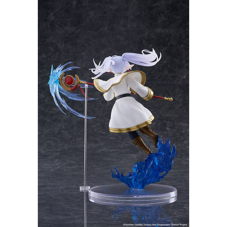 Frieren AMP+ Figure from Frieren: Beyond Journey’s End by Taito, dynamic battle pose with flowing cloak and detailed sculpt.