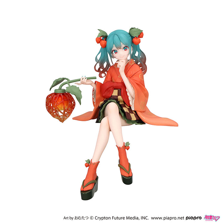 Official FuRyu Hatsune Miku Winter Cherry Flower Fairy Noodle Stopper figure, 6-inch collectible in colorful fairy costume.