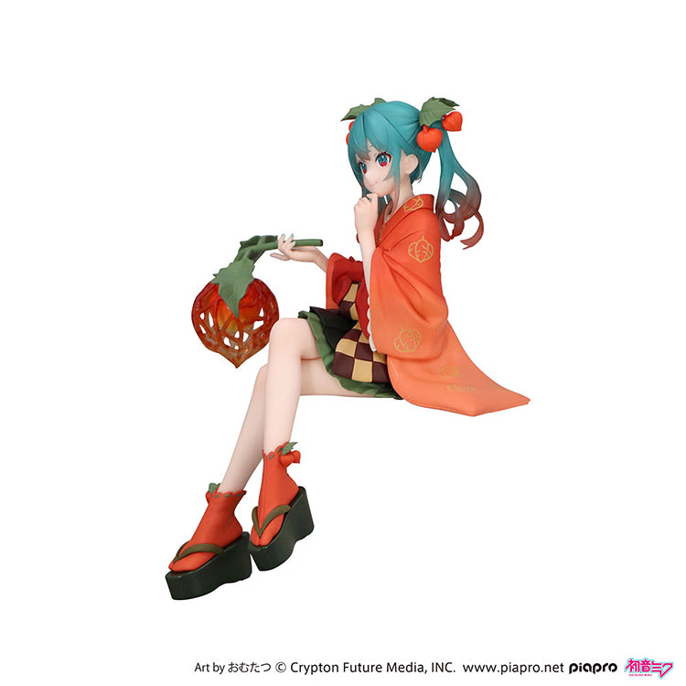 Official FuRyu Hatsune Miku Winter Cherry Flower Fairy Noodle Stopper figure, 6-inch collectible in colorful fairy costume.