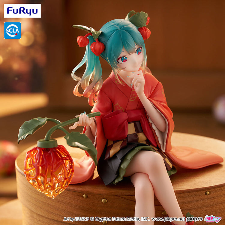 Official FuRyu Hatsune Miku Winter Cherry Flower Fairy Noodle Stopper figure, 6-inch collectible in colorful fairy costume.