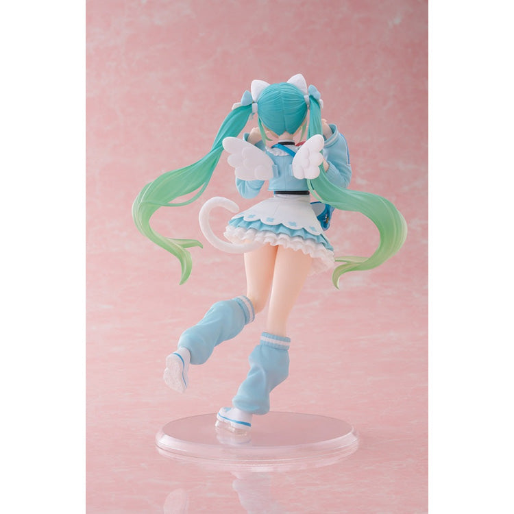 Back view of the Hatsune Miku Fancy Ver. figure, displaying her long, flowing teal pigtails, white angel wings, and curved cat tail.