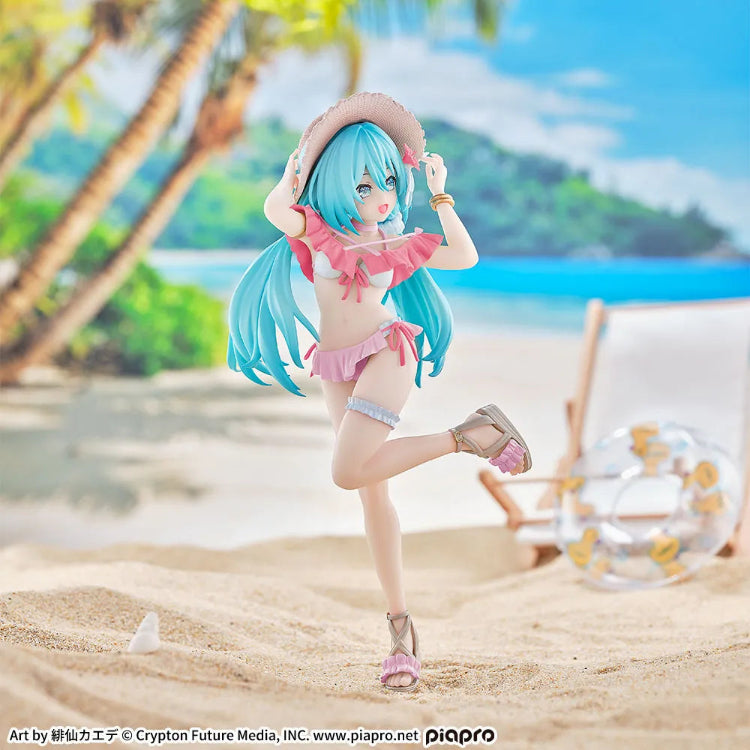 Close-up of Hatsune Miku Tropical Ver. figure face, smiling with hibiscus hair clip and wide-brim sun hat