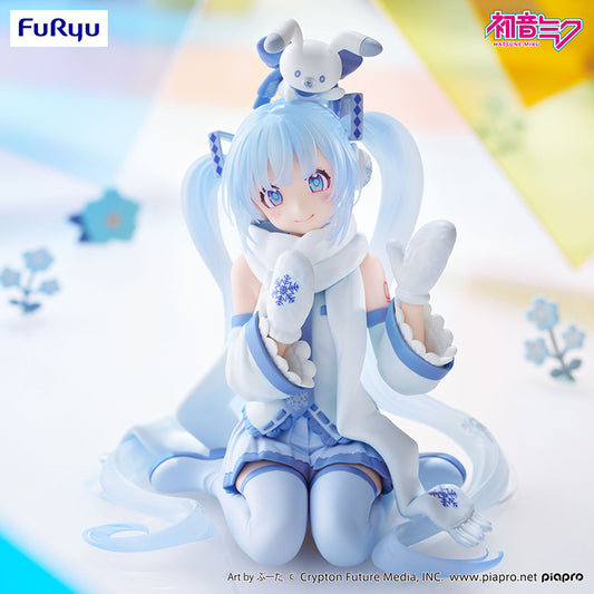 Snow Miku Noodle Stopper figure in a kneeling pose with mittens and a snowflake-patterned scarf against a colorful background.