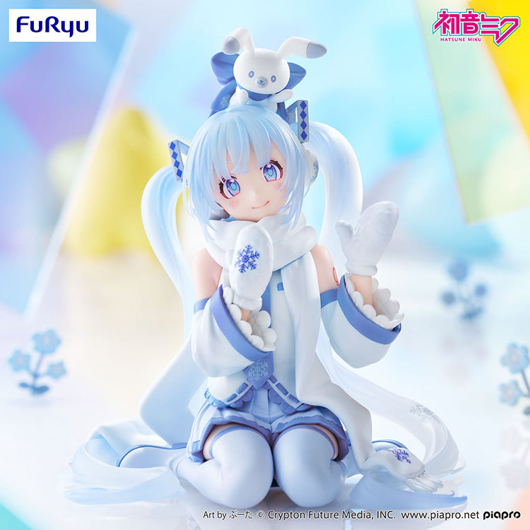 Front view of the Hatsune Miku Snow Miku Sky Town 10th Anniversary figure featuring translucent blue pigtails.