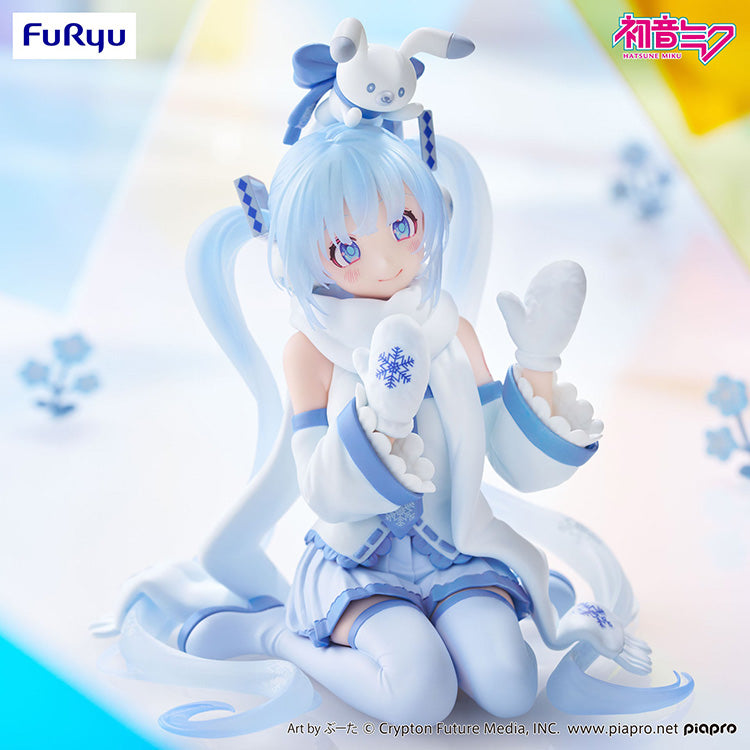 Close-up of the upper body of the Snow Miku Sky Town 10th Anniversary figure with a smiling expression and winter accessories.