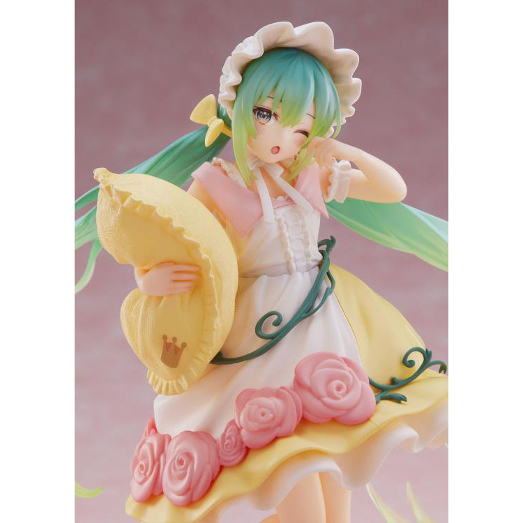 Vocaloid Hatsune Miku Sleeping Beauty Wonderland figure by Taito wearing a fairytale-inspired outfit and holding a pillow