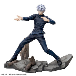 Static figure of a Satoru Goji from Jujutsu Kaisen in a dynamic pose on a rocky base with wooden elements.