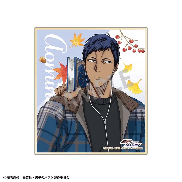 A mini shikishi art board of Daiki Aomine wearing a blue plaid jacket and headphones around his neck. He is looking off to the side while holding a book, surrounded by seasonal ginkgo and maple leaves.