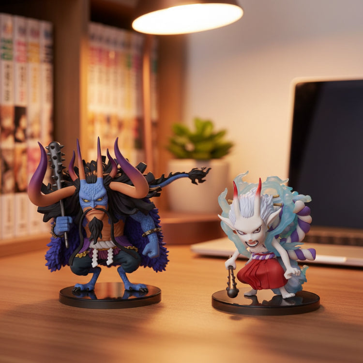 Two fantasy figurines on a green polka dot background