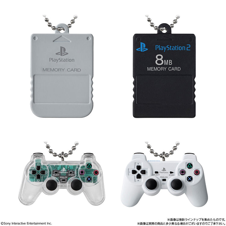 Miniature PlayStation hardware charms including PS1 and PS2 memory cards plus clear and white DualShock controllers.