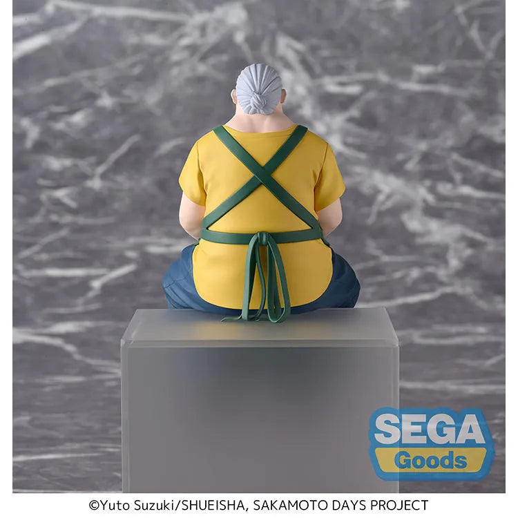 Back view of Taro Sakamoto SAKAMOTO DAYS SEGA Chokonose Figure in yellow shirt and green store manager apron.