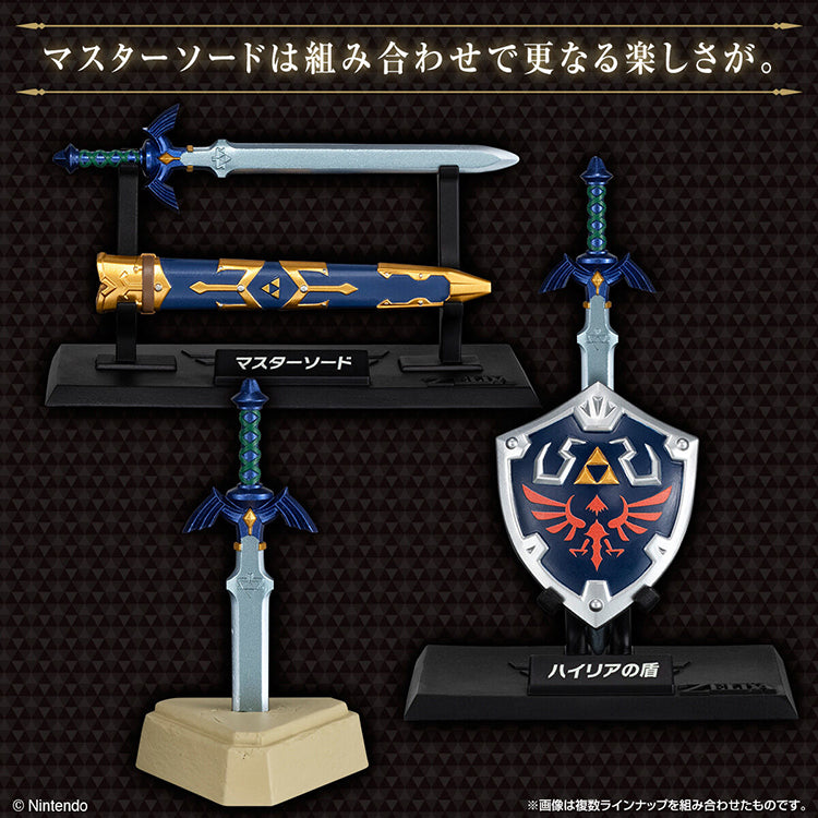 Zelda Weapon Collection miniatures featuring the Master Sword with scabbard and Hylian Shield on engraved display stands.
