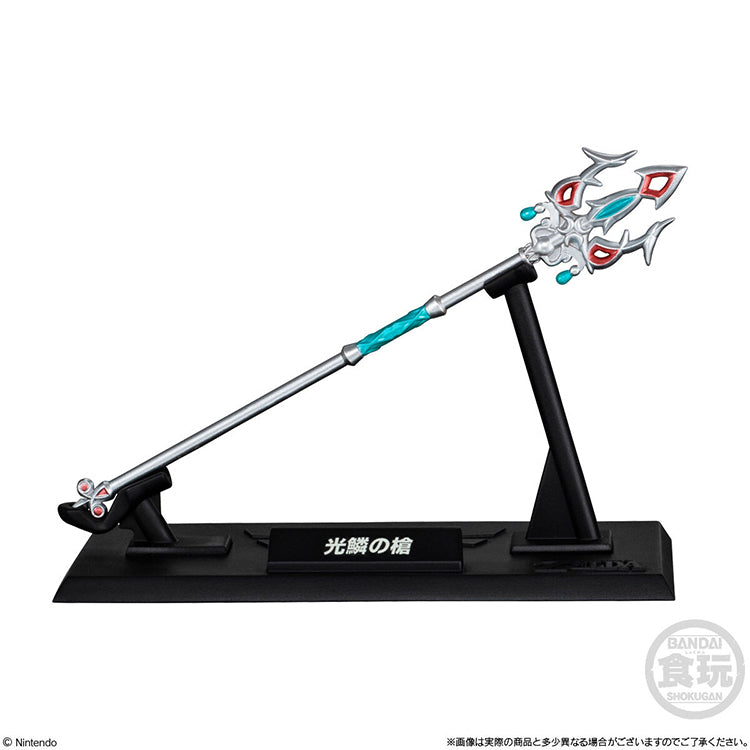 The Legend of Zelda Lightscale Trident miniature weapon figure on an engraved black display pedestal.